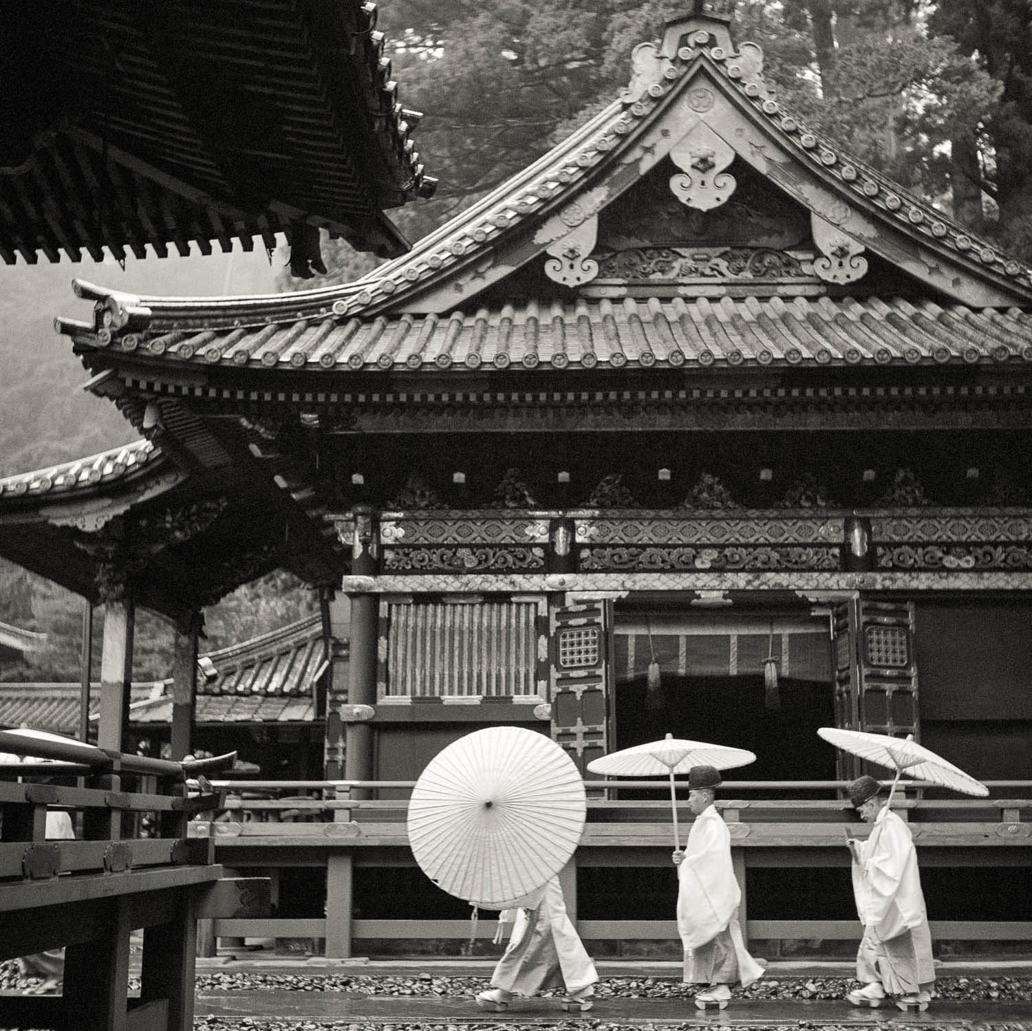 Horace Bristol_Three Priests with Umbrellas at Nikkon Shrine, 1947