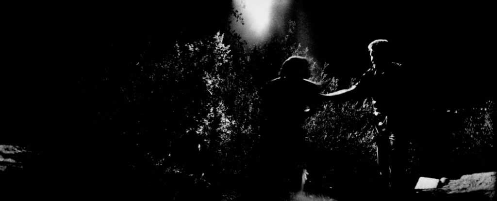 Arrest of undocumented worker by U.S. Border Patrol near Tijuana, 1:00 a.m., U.S.-Mexican Border, Tijuana, Mexico, 1989. © Susan Meiselas / Magnum Photo