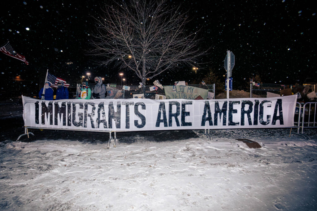 Carrie Schreck, Immigrants are America (anti-ICE protest, Minneapolis, MN), 2026
