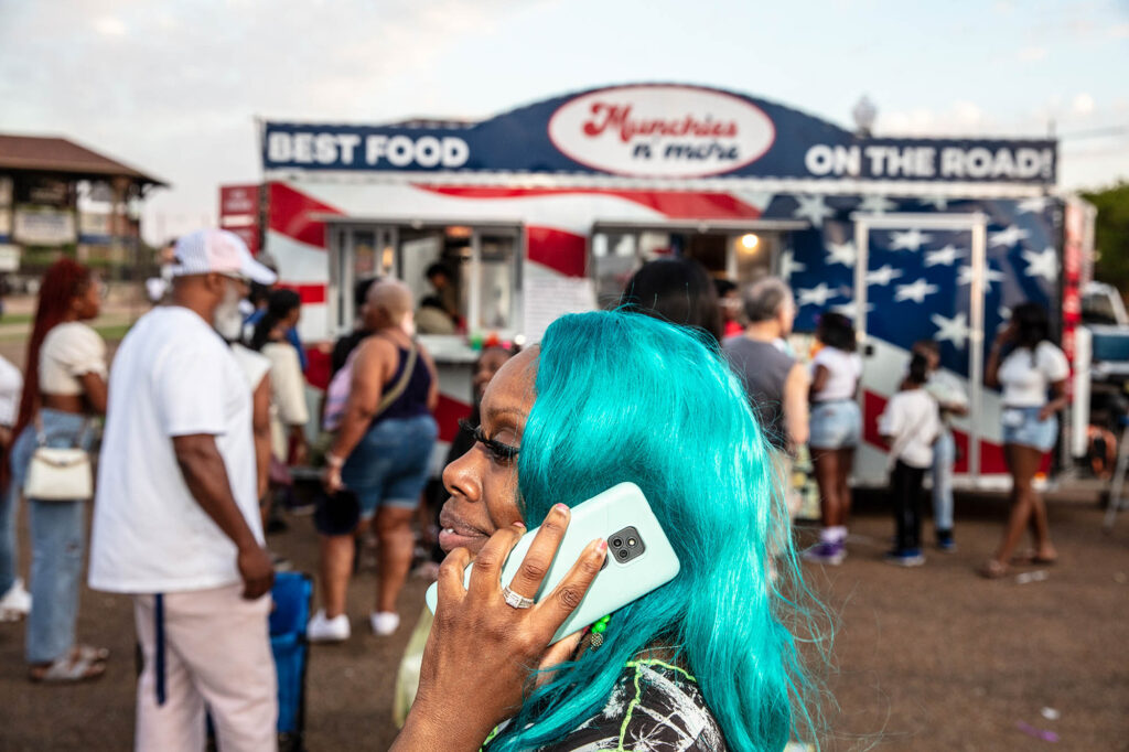 Ed Kashi, A woman on her cellphone during the Juke Joint Festival in Clarksdale, Mississippi, 2025